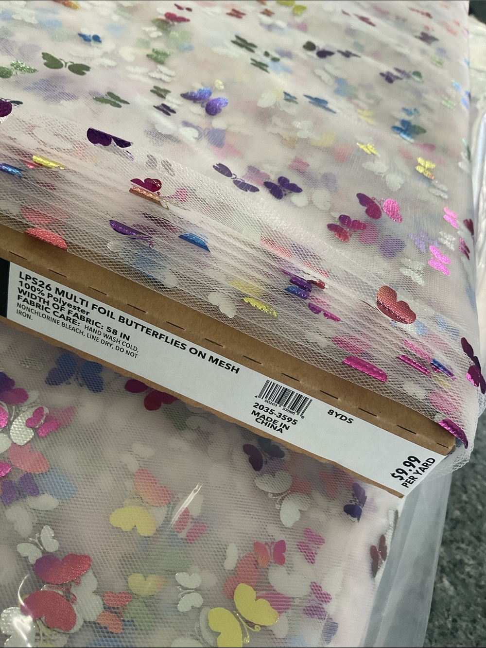 Fabric. Butterflies on mesh. 8 yds on bolt. New!